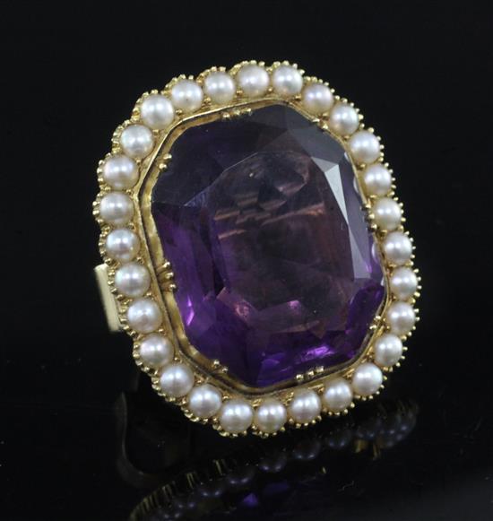 A large gold, amethyst and pearl dress ring with hinged expanding shank, in Collingwood gilt tooled box.